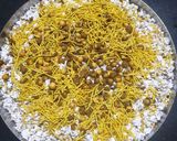 A picture of step 1 of Dhani Daliya Bhel.