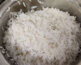 A picture of step 1 of Achari alu kadi rice.