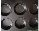 A picture of step 5 of Orange black berry muffins.