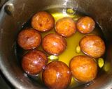 A picture of step 7 of Pineapple gulab jamun.