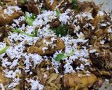 A picture of step 8 of Mocha(banana flower) narikel (coconut) chochori.