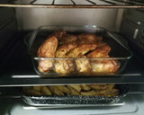 Foto del paso 7 de la receta: Alitas de pollo adobadas con patatas gajo al horno