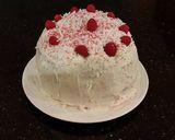 A picture of step 25 of Vanilla Lemon Raspberry Layer Cake with Whipped Cream Buttercream Frosting.