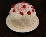 A picture of step 25 of Vanilla Lemon Raspberry Layer Cake with Whipped Cream Buttercream Frosting.
