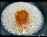 Foto del passaggio 6 della ricetta Risotto con Missoltino, Burrata e Cipolla Marinata