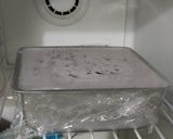 A picture of step 8 of No Bake Blueberry Biscuit Cake.