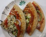 A picture of step 8 of Onion capcicum tomato pizza.