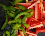 A picture of step 1 of Carrot & capsicum sambharo.