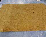 A picture of step 12 of Carrot Cake Roll with Whipped Cinnamon Cream Cheese Filling and Frosting.