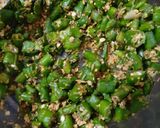 A picture of step 2 of Gujrati Green Chilli pickle.
