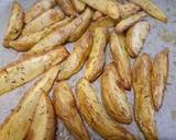 Spicy Cajun chicken with potato wedges and buttered corn recipe step 1 photo