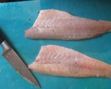 A picture of step 4 of Pan fried seabass fillets on a bed of citrus broccoli.