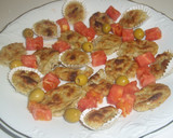 Foto del paso 11 de la receta: Flores de berenjena con tomate y aceitunas