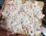 A picture of step 2 of Curd onion tomato sandwich.
