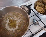 Foto del paso 7 de la receta: Alcachofas rellenas con habitas y guisantes (vegano)