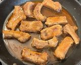 A picture of step 4 of Our Saturday night honey black pepper ribs.