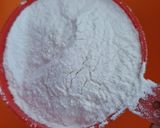 A picture of step 3 of Dilkush or sweet bread with coconut and tutti frutti filling.