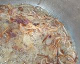 A picture of step 1 of Matar pulau with dill leaves.