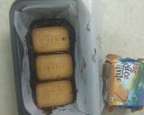 A picture of step 9 of Chocolate Biscuit Cake with Sugar coated Coconut Biscuits.