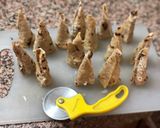A picture of step 2 of Pizza cones.