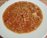 Foto del paso 15 de la receta: Alubias con calamar, gambas y almejas
