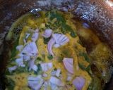 A picture of step 4 of Poi Leaves Masala Bora.
