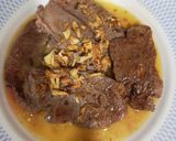 Foto del paso 6 de la receta: Berenjenas rebozadas y filetes al ajillo