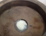 A picture of step 3 of Nawabi Paneer Korma in white Gravy.