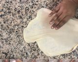 A picture of step 3 of Eggless Parotta.