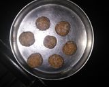 A picture of step 2 of Til gurd katori with gurd coconut ladoo.