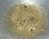 A picture of step 2 of Tadka Green pulao.