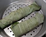 A picture of step 5 of Pabda Paturi (with Taro/ kochu/Alvi leaves) and Pabda Bhappa.