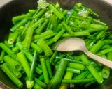 A picture of step 1 of Onion stalk stir fried with Potato.