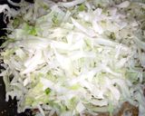 A picture of step 12 of Dambun shinkafa with cabbage.