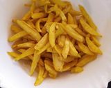 A picture of step 4 of Spicy turmeric chips.