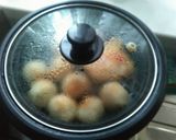 A picture of step 2 of Japanse  steamed smoke haddock fillets in sake thai sweet chilli sauce japanese sticky yakiniku sauce with dough garlic balls steamed.