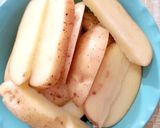 Foto langkah ke 1 dari resep Crispy Potato Wedges.