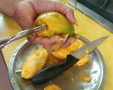 A picture of step 2 of Ice cream loaded mango.