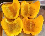 A picture of step 2 of Curried potato filled peppers with cheese.
