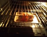 A picture of step 11 of Rock Cornish Game Hen stuffed and glazed.