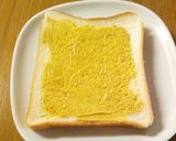 A picture of step 1 of For Breakfast: Curry, Mayonnaise and Corn on Toast.