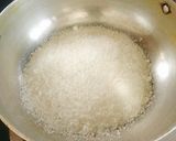 A picture of step 1 of COCONUT LADDU (Milkmaid Coconut Laddu).