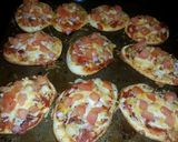 A picture of step 7 of Jens famous Lil pizzas.