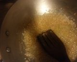 A picture of step 1 of Spicy garlic rice with peas and carrots.