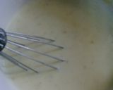 A picture of step 2 of Easy, Quick, and Microwaved Basic White Sauce.