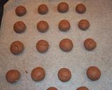 A picture of step 6 of Snowball-style Decorated Chocolate Cookies.