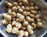 A picture of step 1 of Baby Potatoes Sabzi.