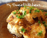 A picture of step 22 of Authentic Garlic Chicken in a Frying Pan.