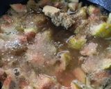A picture of step 3 of Gajar Chunda oats beans aloo tikki fig chutney sandwich in Indian bread.