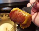 A picture of step 11 of Cheesy bacon wrapped tots.
